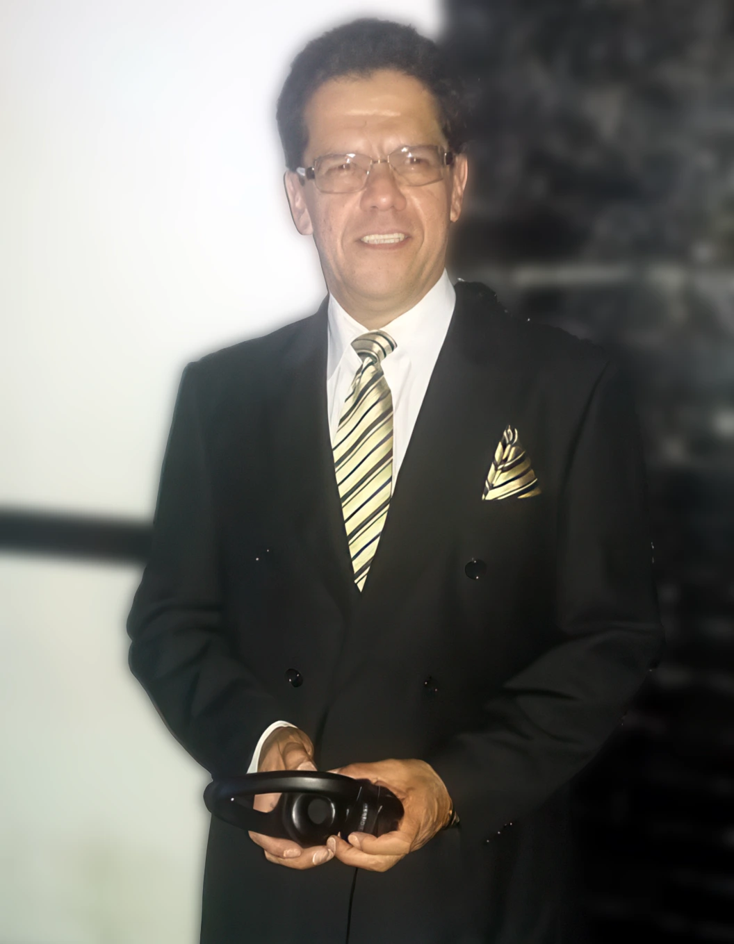 A side view of a plate of figs and berries. 